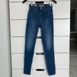 Levi’s 721 jeans with bottom zippers